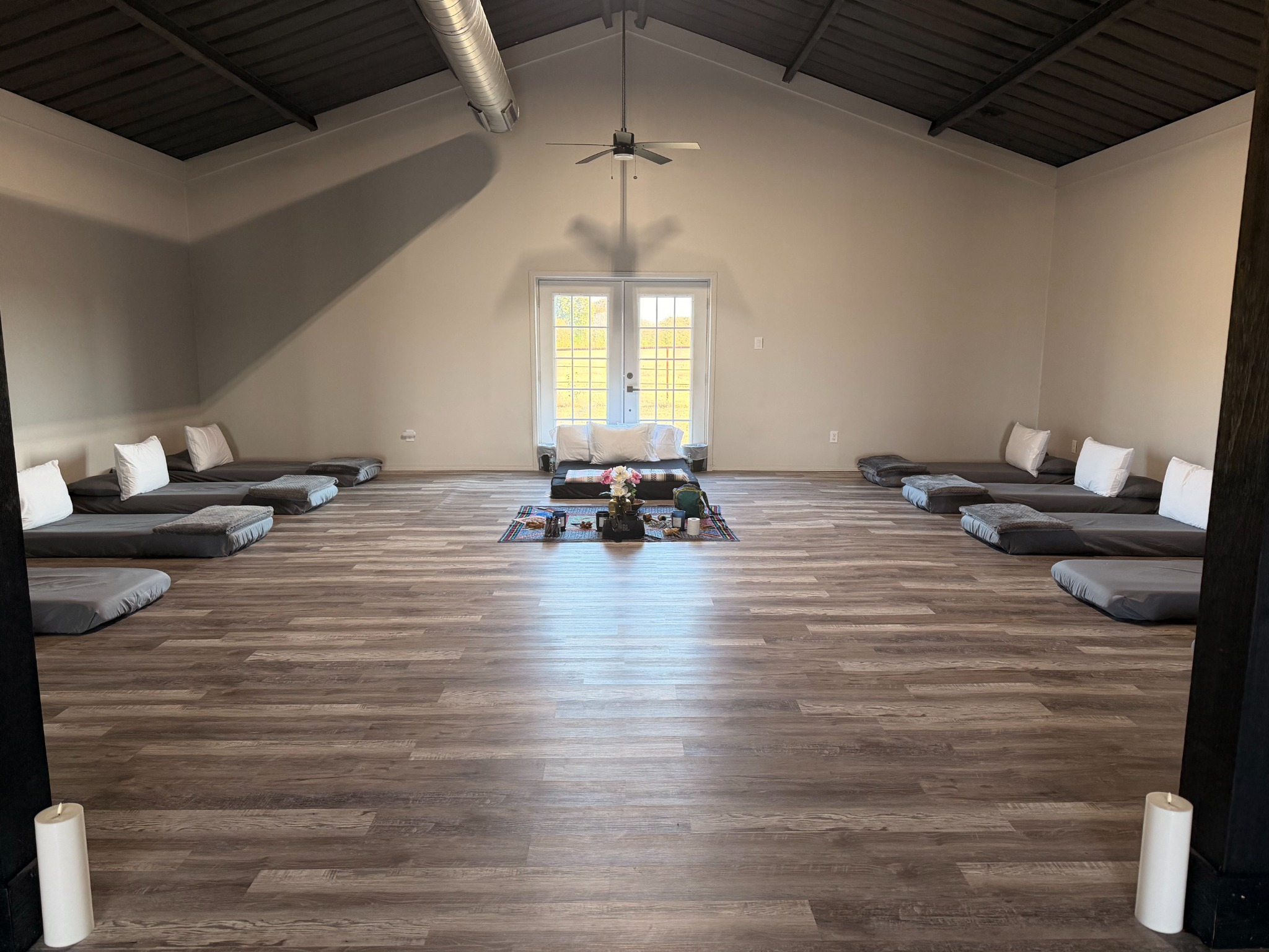AyaWaken ceremony space arranged with mats and altar